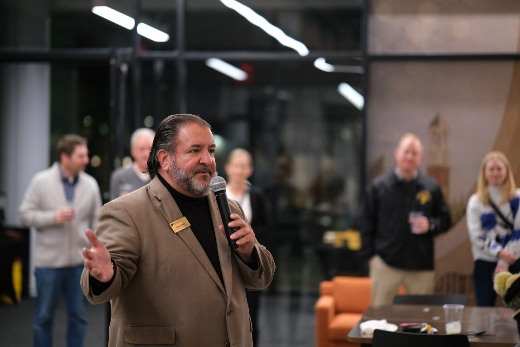 man presenting in lobby