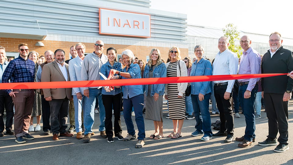 ribbon cutting in front of Inari